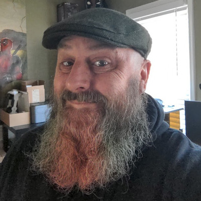 A photo of me wearing a flatcap